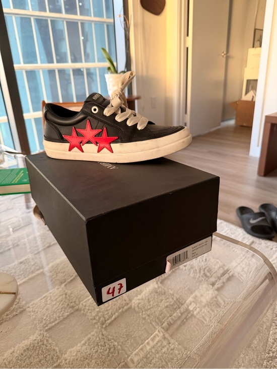 AMIRI Black Leather Sneakers with Red Star Accents